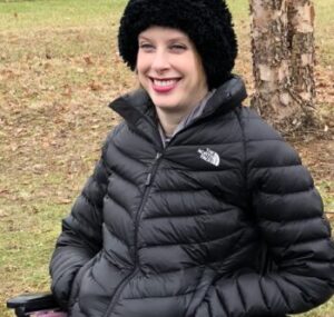 Jenny Smith in a North Face Jacket and fuzzy black hat
